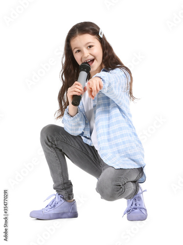 Cute little girl singing ag...