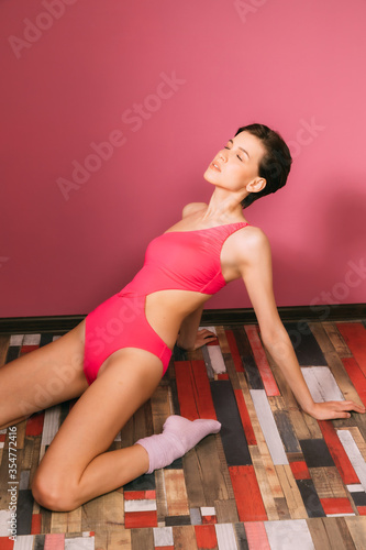 young woman doing stretching and gymnastic exercises