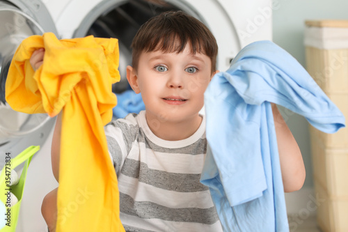 Little boy with dirty cloth...