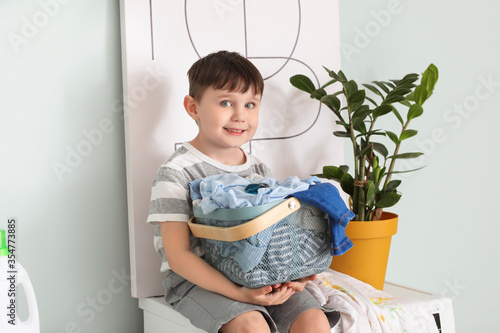 Little boy with dirty cloth...
