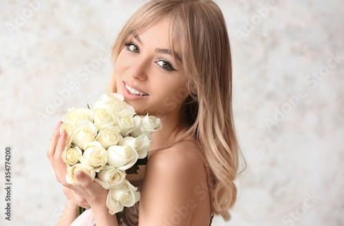 Beautiful young woman with ...