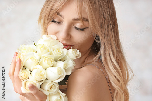 Beautiful young woman with ...