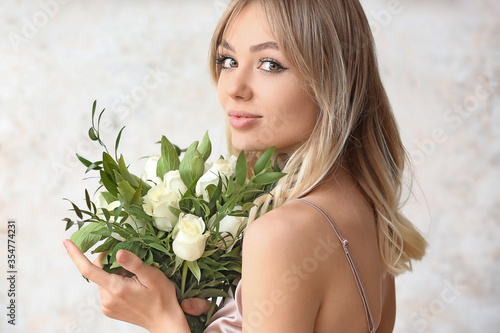 Beautiful young woman with ...