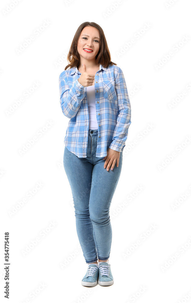Beautiful young woman showing thumb-up gesture on white background Beautiful young woman showing thumb-up gesture on white background