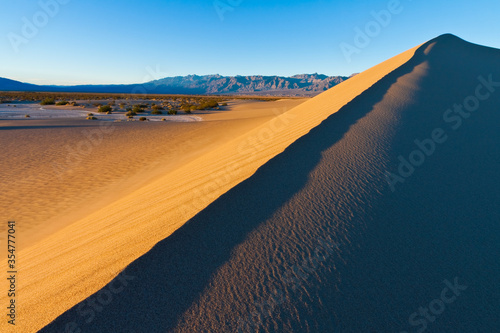 Star Dune is the Tallest of Mesquite Flat Sand Dunes With Armagosa Mountain Range in the Distance, Death Valley National Park, California, USA