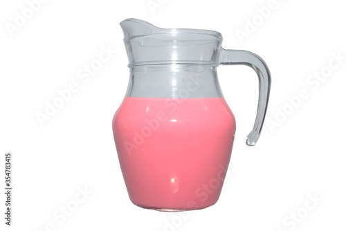 pink milk in clear jar isolated on white background