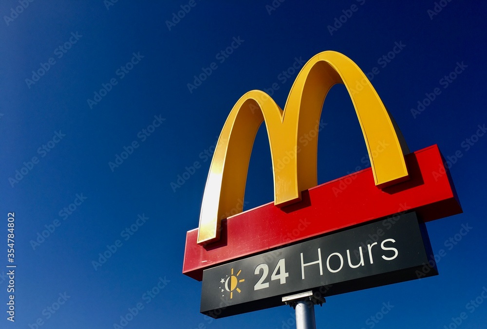 McDonald's Corporation restaurant logo sign open 24 hours Stock Photo