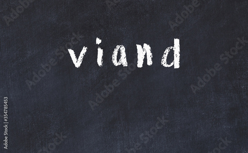 Foto Black chalkboard with inscription viand on in