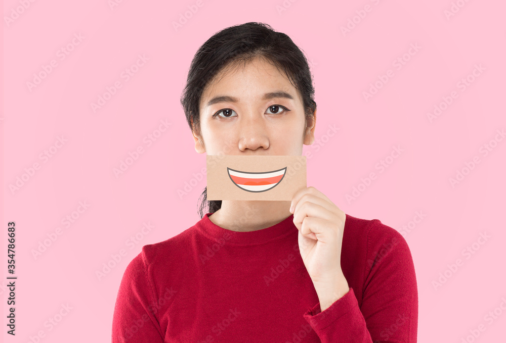 young asian woman holding happy emotion paper , advertising banner young asian woman holding happy emotion paper , advertising banner