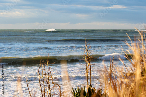 Large Waves from Typhoon, Hurricane, breaking, climate & ocean temperatures are rising, Surfing In Japan, Near Shidashita, Olympic Venue for surf. photo