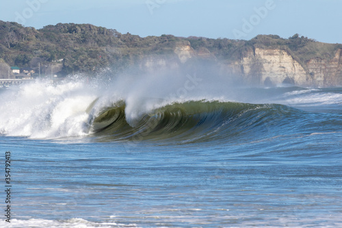 Large Waves from Typhoon, Hurricane, breaking, climate & ocean temperatures are rising, Surfing In Japan, Near Shidashita, Olympic Venue for surf. photo