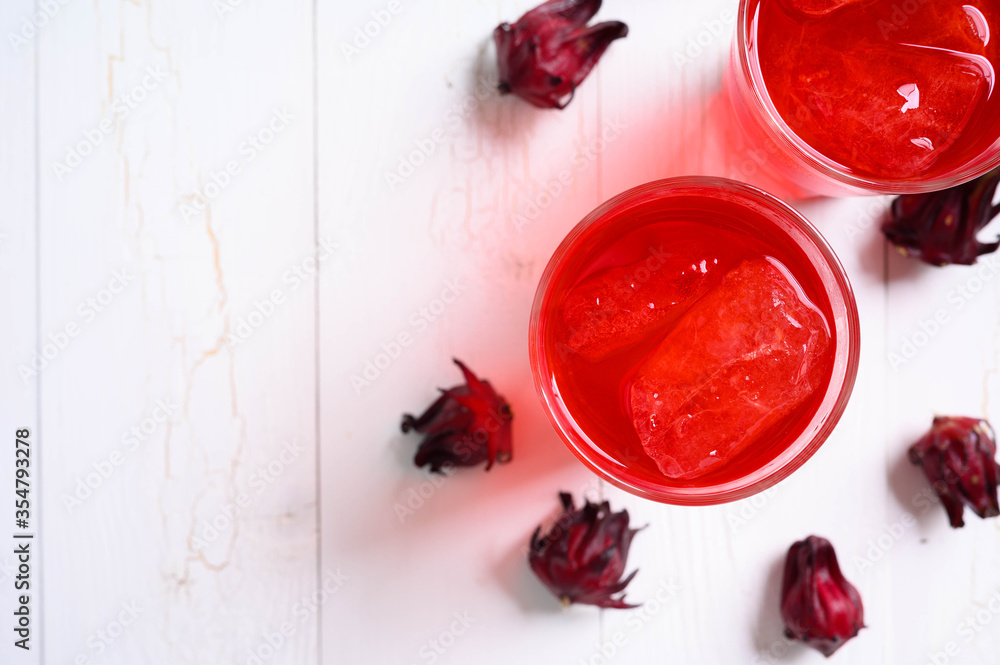 Roselle juice on wooden background, herbal organic tea for good healthy Roselle juice on wooden background, herbal organic tea for good healthy