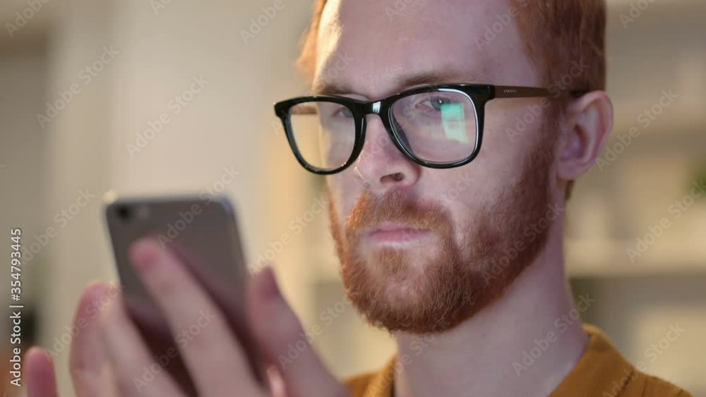 Close up of Young Man using Smartphone with Chroma Screen 