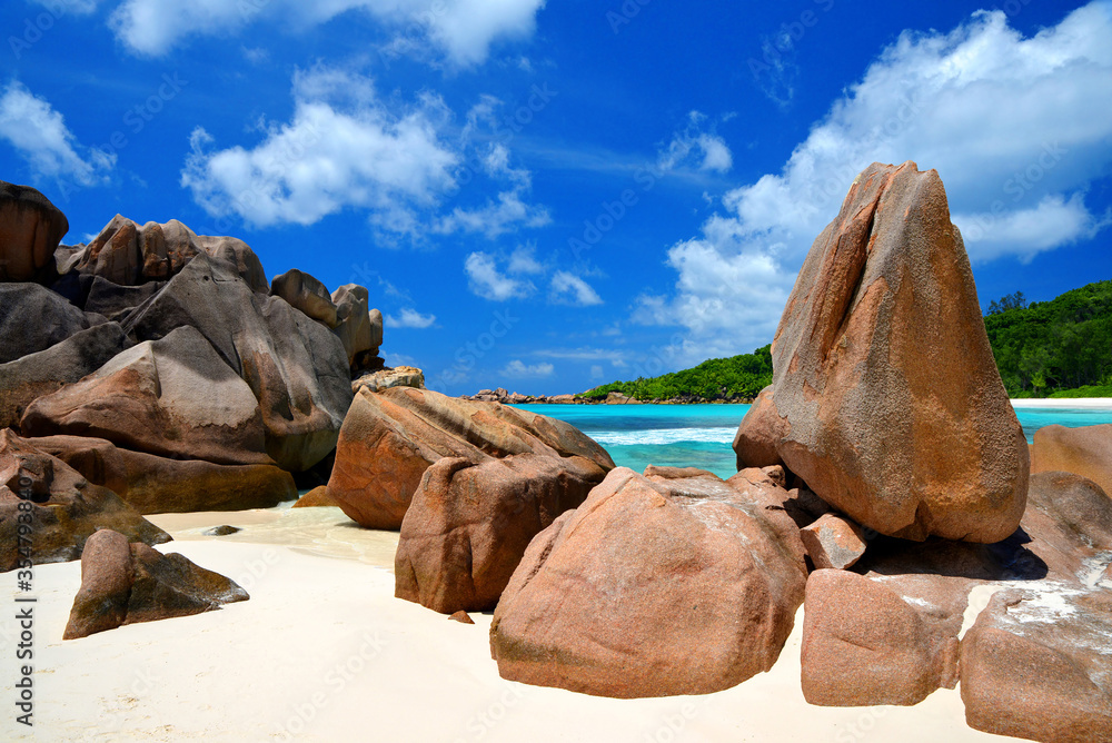 Anse Cocos beach with big granite stones in La Digue Island, Indian Ocean, Seychelles. Anse Cocos beach with big granite stones in La Digue Island, Indian Ocean, Seychelles.