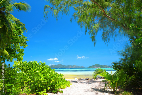 Beatiful beach Anse Source d'Argent in sunny day. La Digue Island, Seychelles.
