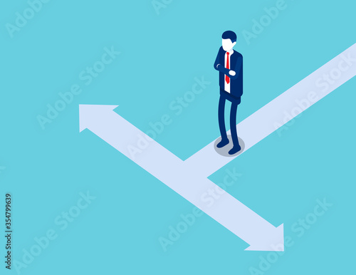 A man is standing on a road divided into two opposite direction. Isometric business vector style