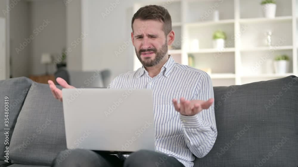 Shocked Young Man Reacting to Failure at Home Shocked Young Man Reacting to Failure at Home