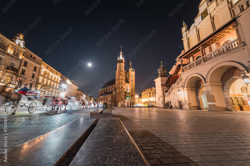 Krakow Old Town with view of St. Mary's Basilica at night