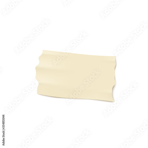 A piece of beige or brown ripped adhesive tape.