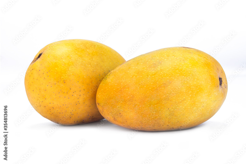 Ripe mangoes isolated on white background
