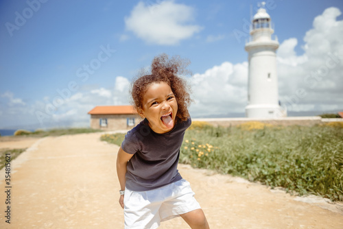 Portrait of a beautiful happy liitle girl close-up photo