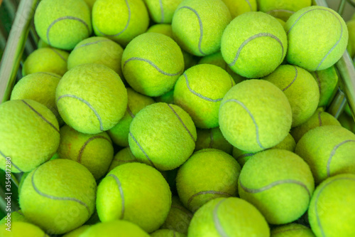 Lively tennis ball, tennis ball theme for gridiron background © supachai