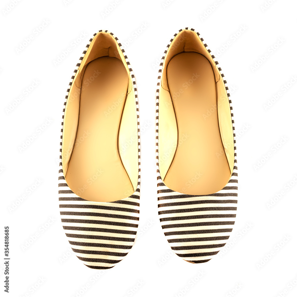 Fototapeta premium Women's summer shoes made of blue and white striped fabric, ballet flats isolated on a white background. The concept of women's shoes. The view from the top