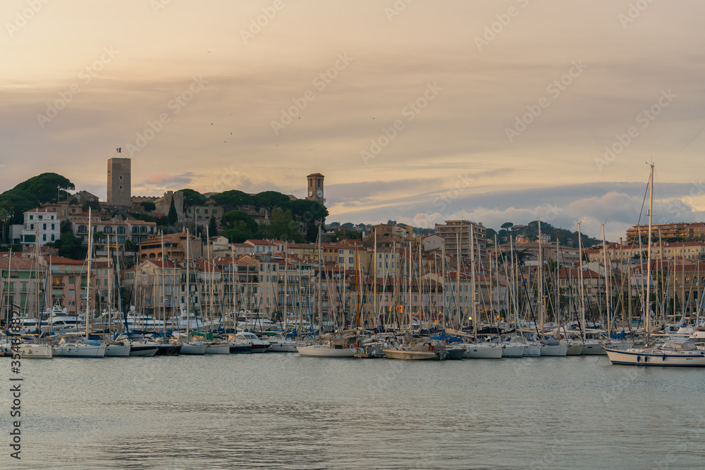 Luxury yachts harbor at golden hour view at Cannes Yacht Charter.
Cannes is one of the most famous resorts on the French Riviera and is home to a huge number of superyachts with its’ two large ports.