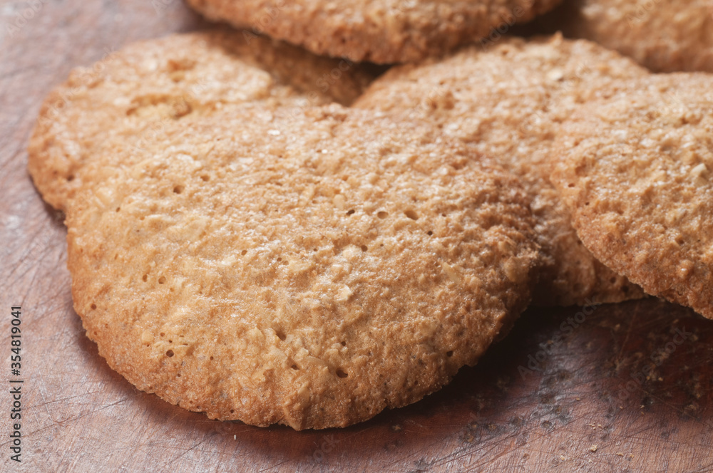 Oatmeal cakes on a wooden board Oatmeal cakes on a wooden board