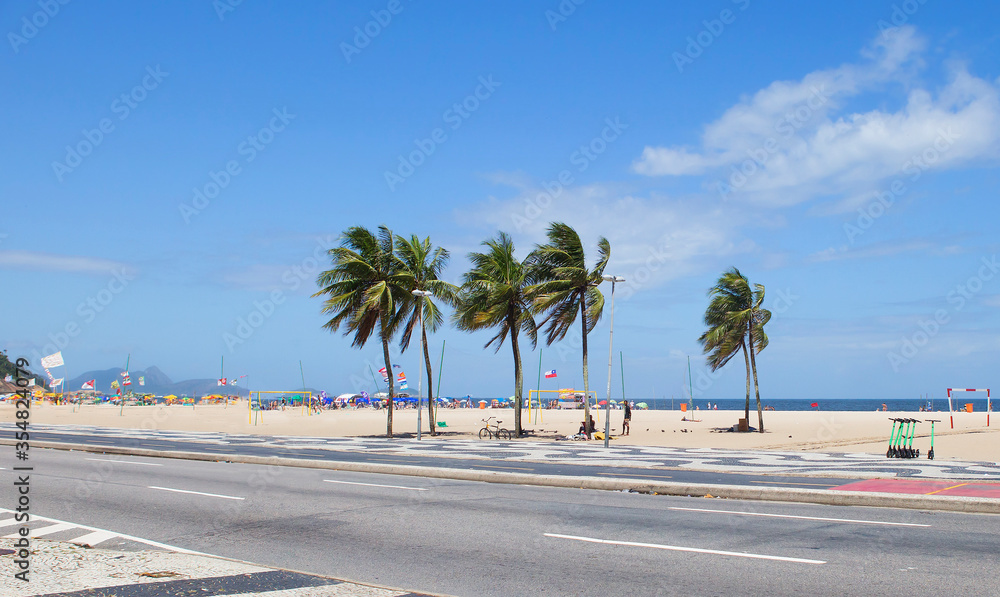 Rio de Janeiro, Brazil, Copacabana promenade and beach.
 Copacabana is a world-famous beach. The sandy strip with a length of more than 4 km is the longest beach in the world and one of th