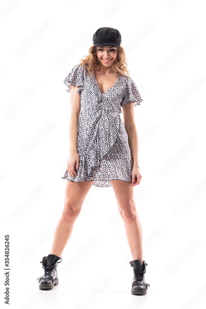 Happy friendly young stylish foxy girl wearing black beret cap and dotted dress with boots Full body length isolated on white background. Happy friendly young stylish foxy girl wearing black beret cap and dotted dress with boots Full body length isolated on white background.
