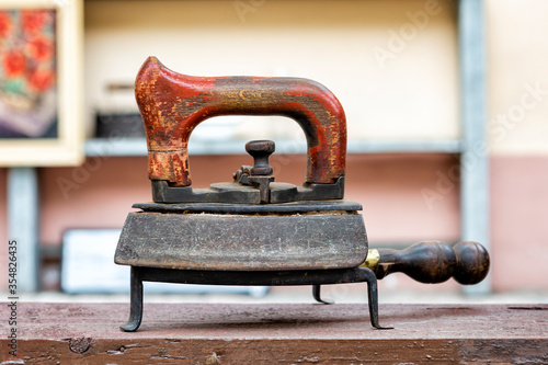 Vintage iron with wooden handle