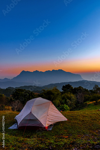 Tourist tent on the hill at San Pa Kia, Doi Mae Ta Man in Chiang Dao, Chiang mai, Thailand. © nuwatphoto