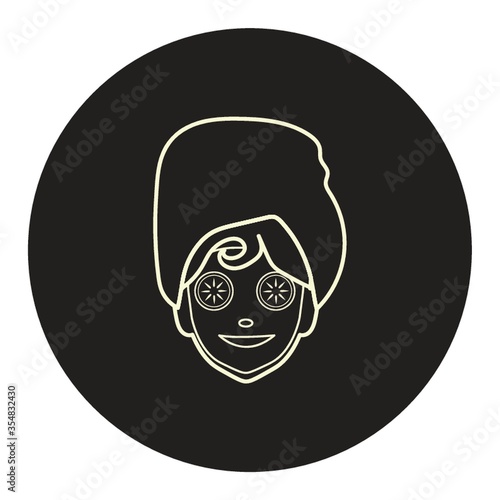 Woman with cucumber slice on eyes
