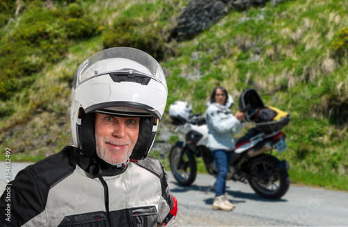 portrait of senior biker with helmet