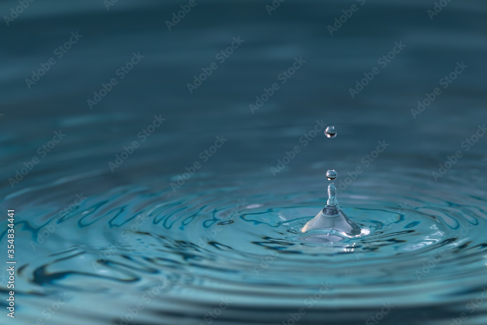 Water splash or water drop with lighting