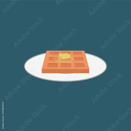 Hot waffle with butter on a plate