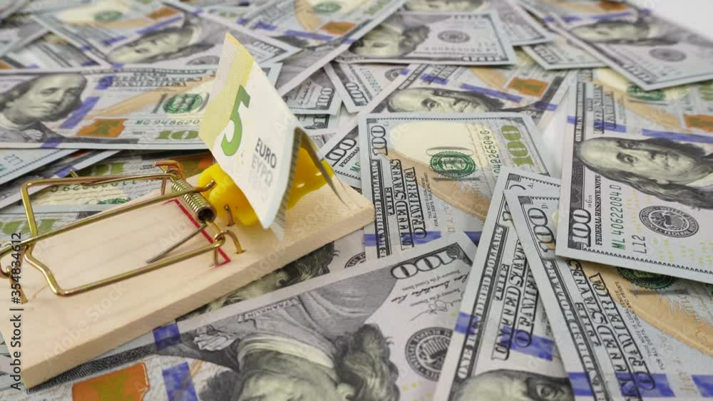 Banknote five euros in a mousetrap. Money is like bait. Cheating, fraud and easy money concept. Dollar background, blank mockup, place for text. Money is like bait. Banknote five euros in a mousetrap. Money is like bait. Cheating, fraud and easy money concept. Dollar background, blank mockup, place for text. Money is like bait.