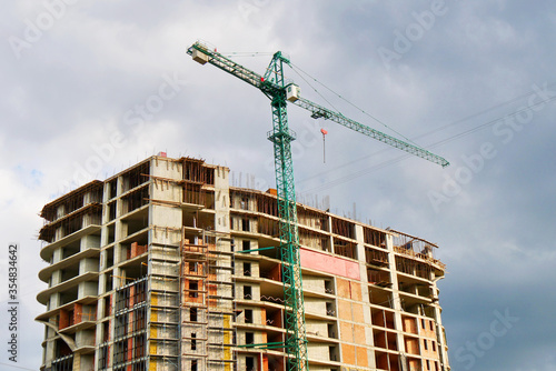 Construction site. Building site with crane. Concrete building under construction © fotolian121212