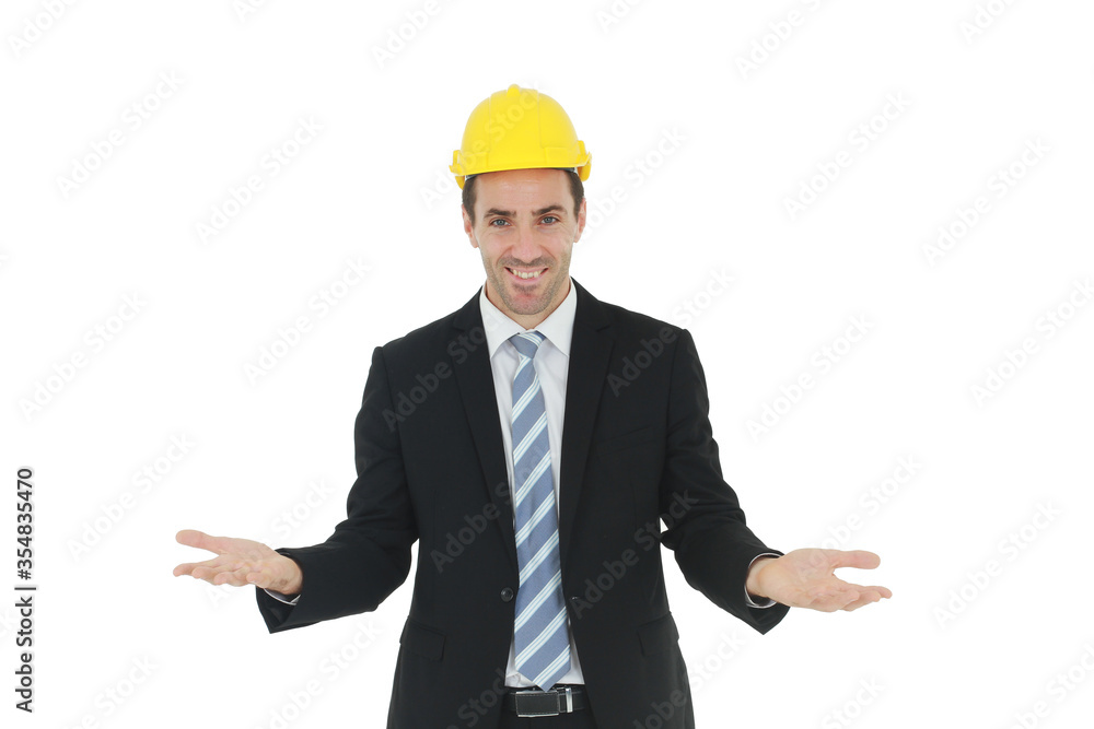 Smiling Handsome and smart engineer in black suit and wearing a yellow safety engineering hat and Spread hands for suspicious in work isolated on white background. Copy Space Smiling Handsome and smart engineer in black suit and wearing a yellow safety engineering hat and Spread hands for suspicious in work isolated on white background. Copy Space
