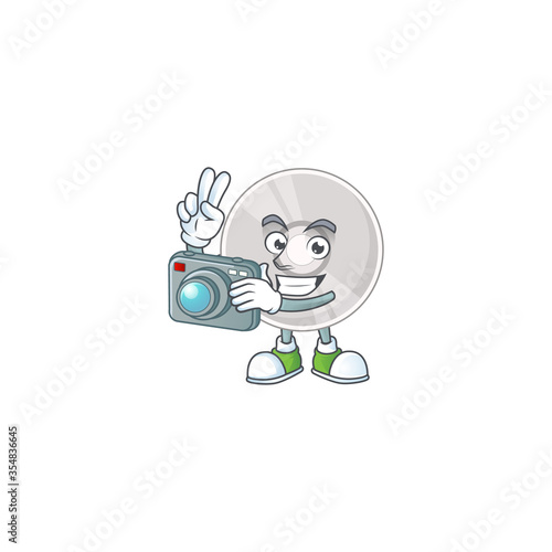 Compact disk photographer mascot design taking a picture with a camera © kongvector