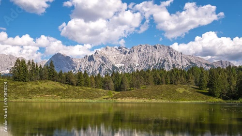 Karwendel alps mountains reflecting in lake Wildensee, near Mittenwald, Bavaria, Germany Time lapse video nature landascapes photo