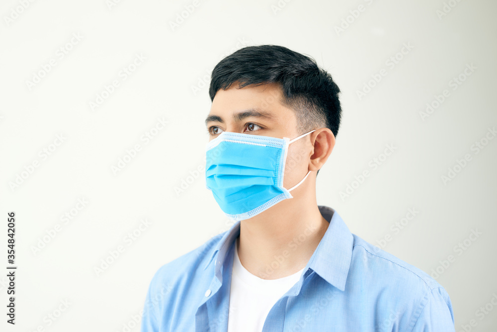 Men wear masks to prevent air pollution, White background, haze and PM 2.5 dust and smoke pollution in big cities. Men wear masks to prevent air pollution, White background, haze and PM 2.5 dust and smoke pollution in big cities.