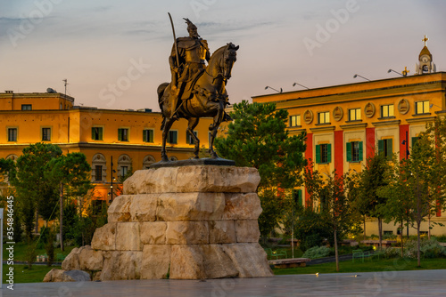 Sunrise view of Skanderbeg statue at Tirana, Albania photo