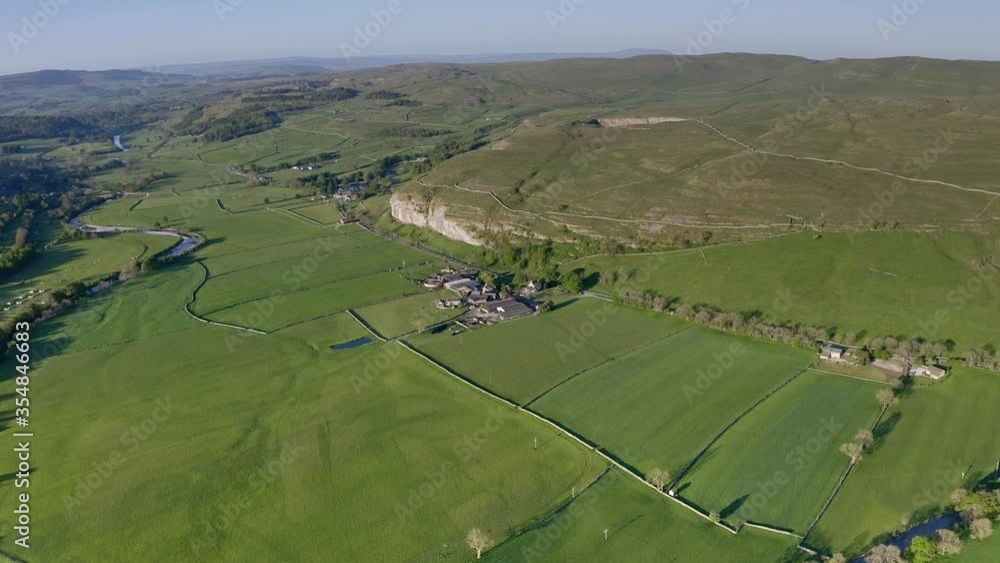 An aerial view of the Wharfedale valley, on the right is the limestone outcrop of Kilnsey crag, and the River Skirfare, right joins the River Wharfe An aerial view of the Wharfedale valley, on the right is the limestone outcrop of Kilnsey crag, and the River Skirfare, right joins the River Wharfe
