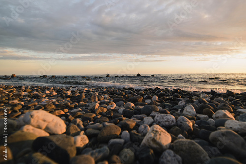 Beautiful sunset on the Black sea. rocks on the sea surf. © Максим Корабельщиков