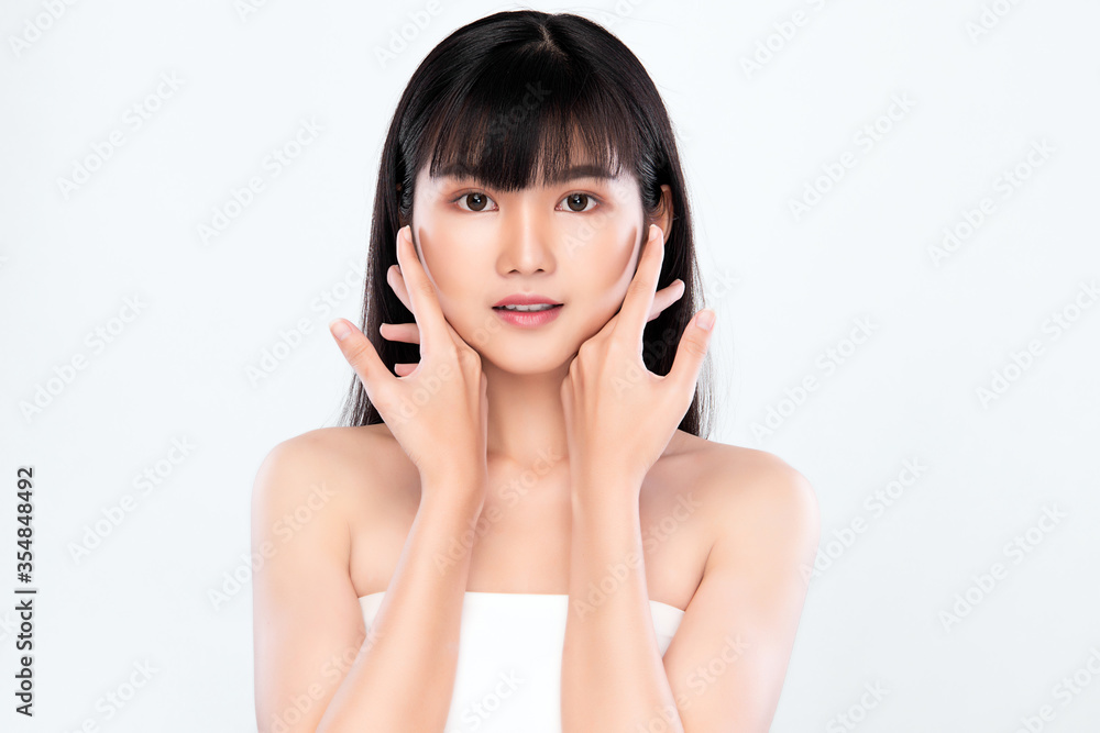 Beautiful Young asian Woman touching her clean face with fresh Healthy Skin, isolated on white background, Beauty Cosmetics and Facial treatment Concept Beautiful Young asian Woman touching her clean face with fresh Healthy Skin, isolated on white background, Beauty Cosmetics and Facial treatment Concept