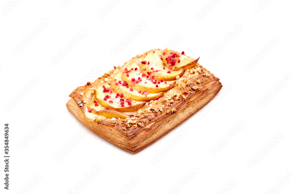 Strudel puff pastry decorated with pieces of kiln apple Strudel puff pastry decorated with pieces of kiln apple