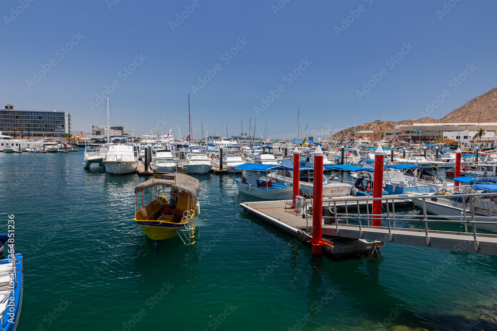 Fishing boats in the harbor. Yachts. 