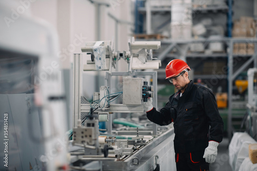 Portrait of worker in factory.